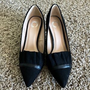 Black pair of heels Size 7